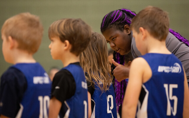 Student volunteer serve upward kids children