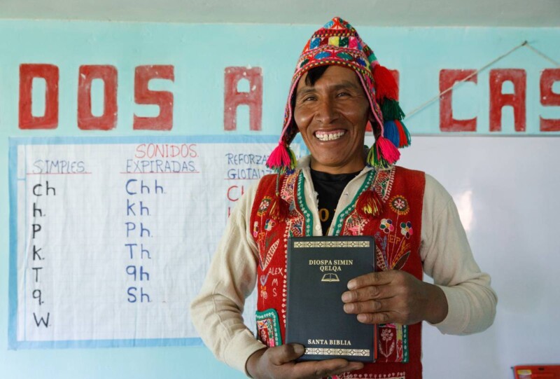 Img peru man holding bible